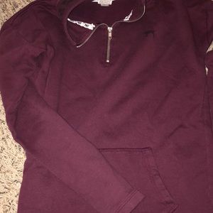Maroon colored half-zip sweatshirt